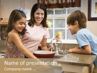 Hispanic Mother And Children In Kitchen Making Cookies. PowerPoint Template