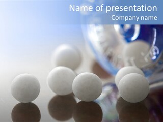 Extreme Macro Of Homeopathic Medications - Small White Balls And The Container PowerPoint Template