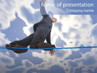 A Man Is Balancing On A Rope With His Hands PowerPoint Template