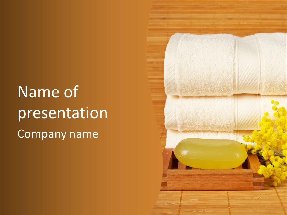 A Bunch Of Towels Sitting On Top Of A Wooden Table PowerPoint Template