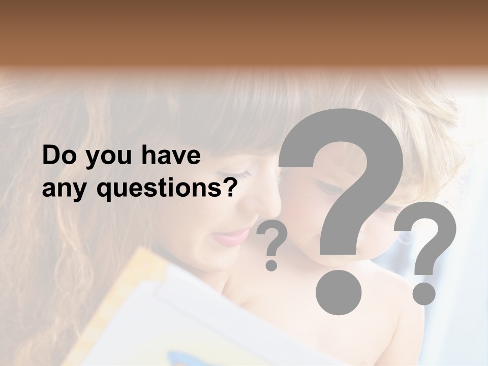 High Key Portrait Of Young Mother Reading A Book For Her Baby [3 Years Old] PowerPoint Template