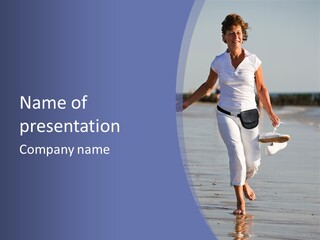 Active And Happy Senior Woman Running At The Beach PowerPoint Template