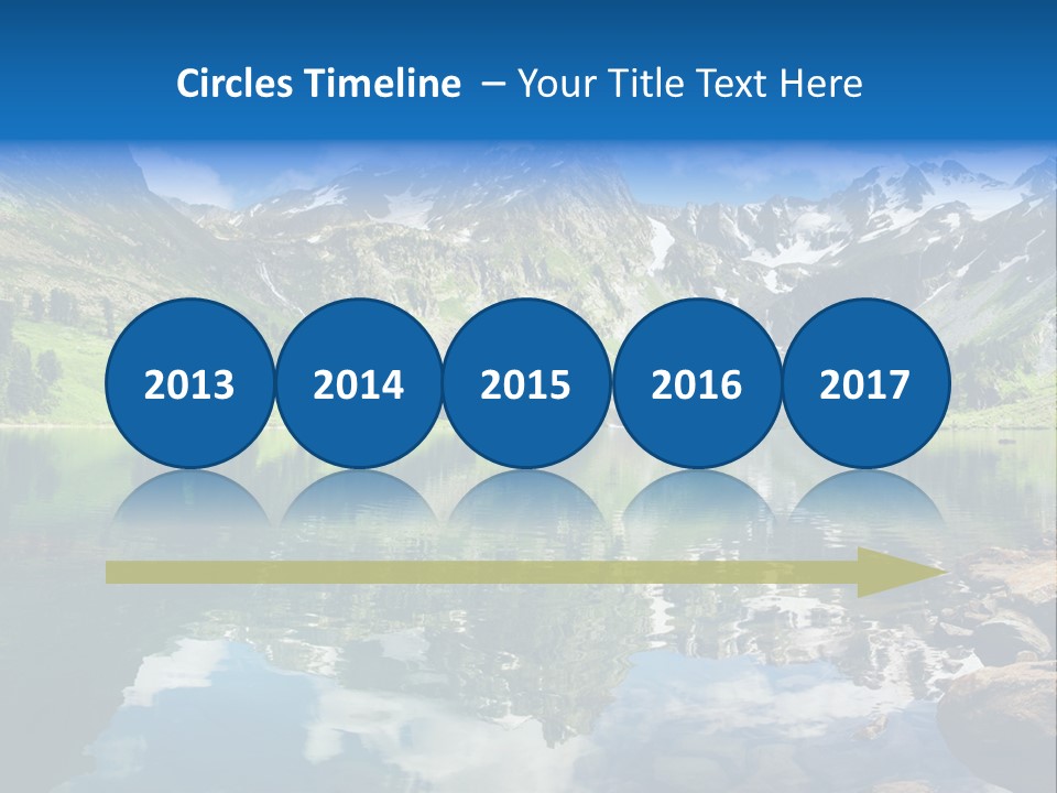 A Mountain Lake Surrounded By Green Trees And Rocks PowerPoint Template