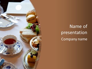 English High Tea Setting With Bread, Scones And Such PowerPoint Template