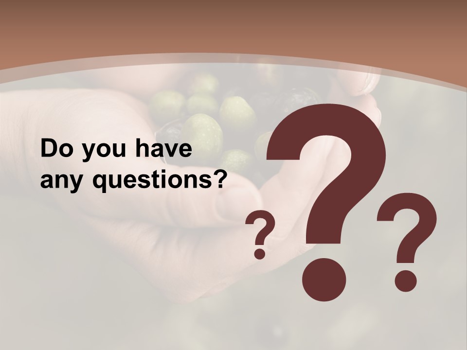 A Person Holding A Handful Of Olives In Their Hands PowerPoint Template