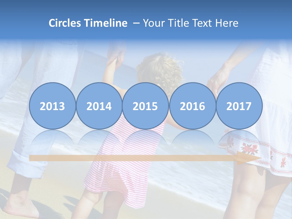View Of Young Family Having Fun On The Beach PowerPoint Template