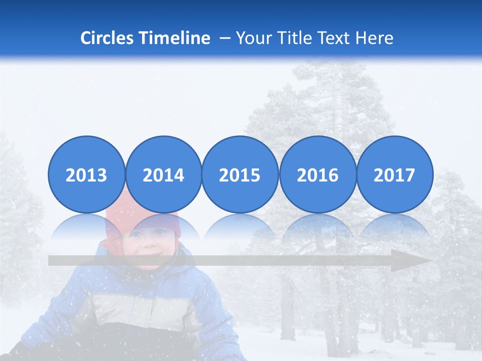 A Child Sledding Down A Hill In The Snow PowerPoint Template