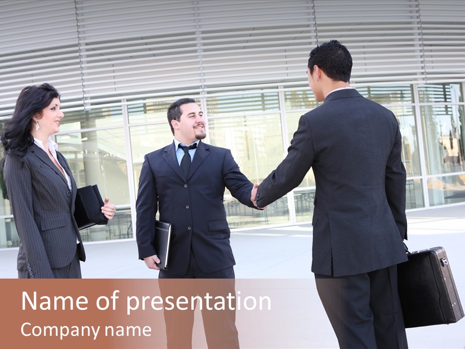 An Attractive Business Team Meeting At Office Building PowerPoint Template