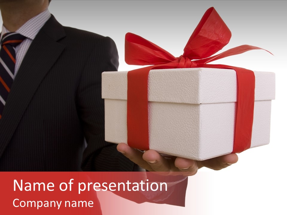 A Businessman Offering A Gift To You (Selective Focus) PowerPoint Template