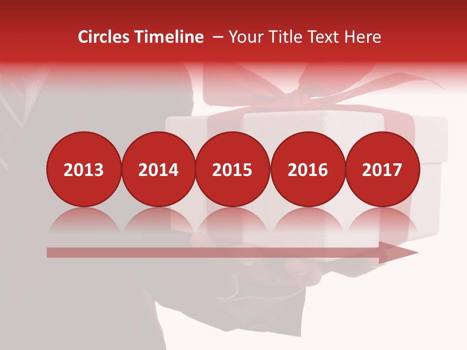 A Businessman Offering A Gift To You (Selective Focus) PowerPoint Template