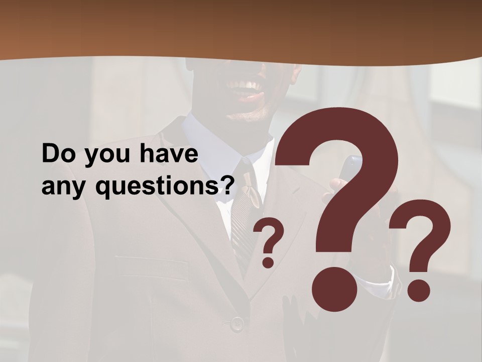 An Confident And Successful African-American Businessman In A Power Suit PowerPoint Template