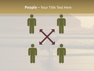 A Surfer Leaves The Surf As The Sun Sets At Polzeath Beach In Cornwall, Uk. PowerPoint Template