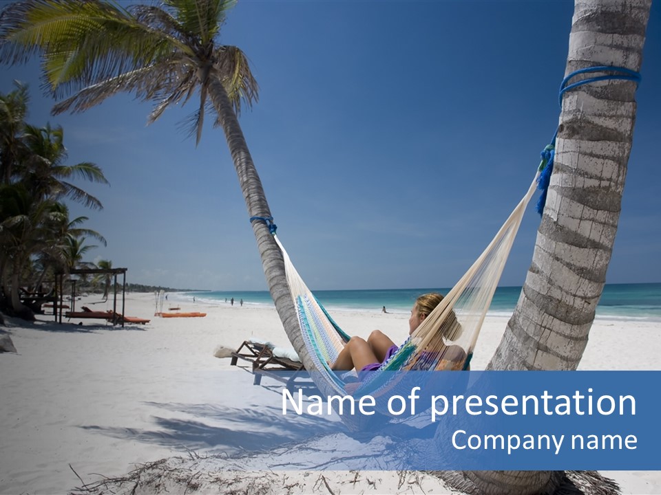 Young Woman Relaxing On The Hammock On A Tropical Beach PowerPoint Template