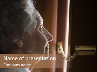 Senior Woman Using A Security Chain On Front Door PowerPoint Template