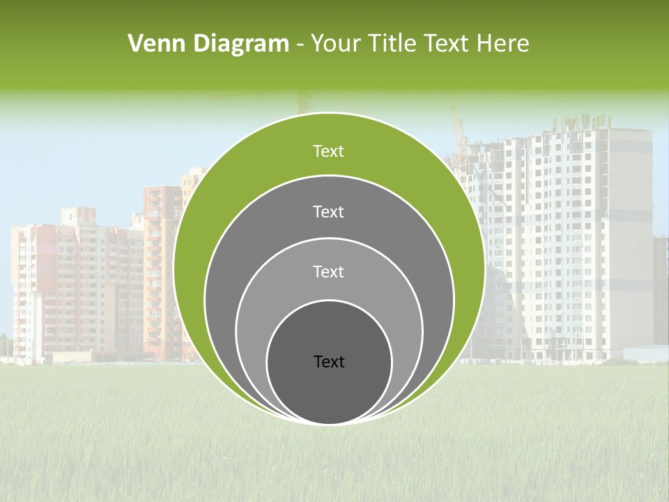 Residential Buildings, Some Of Them Under Construction, With Beautiful Green Field Foreground PowerPoint Template
