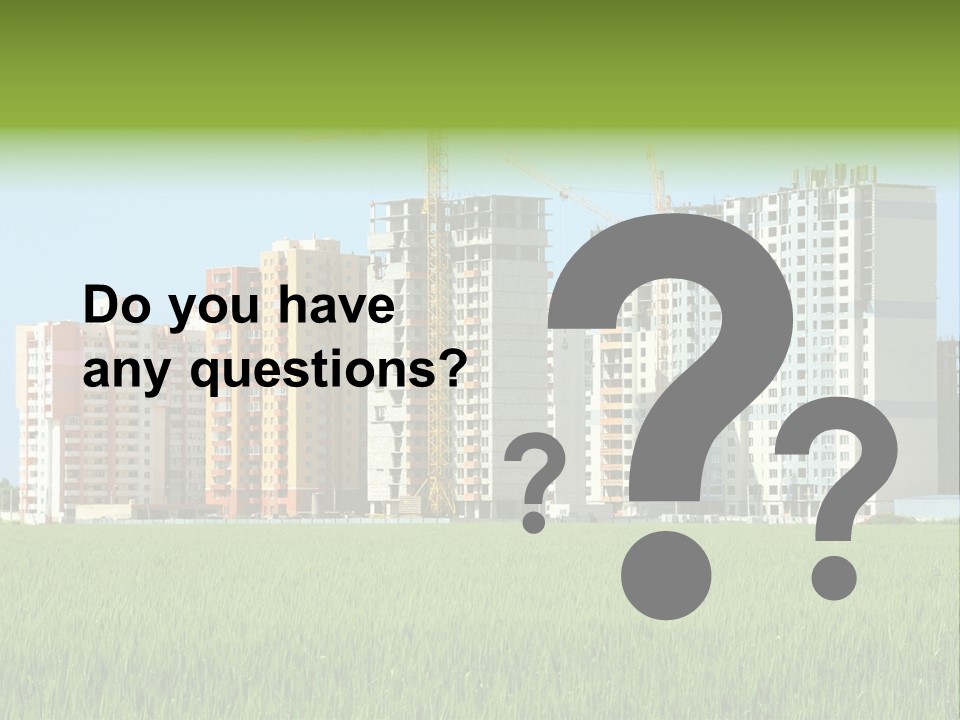 Residential Buildings, Some Of Them Under Construction, With Beautiful Green Field Foreground PowerPoint Template