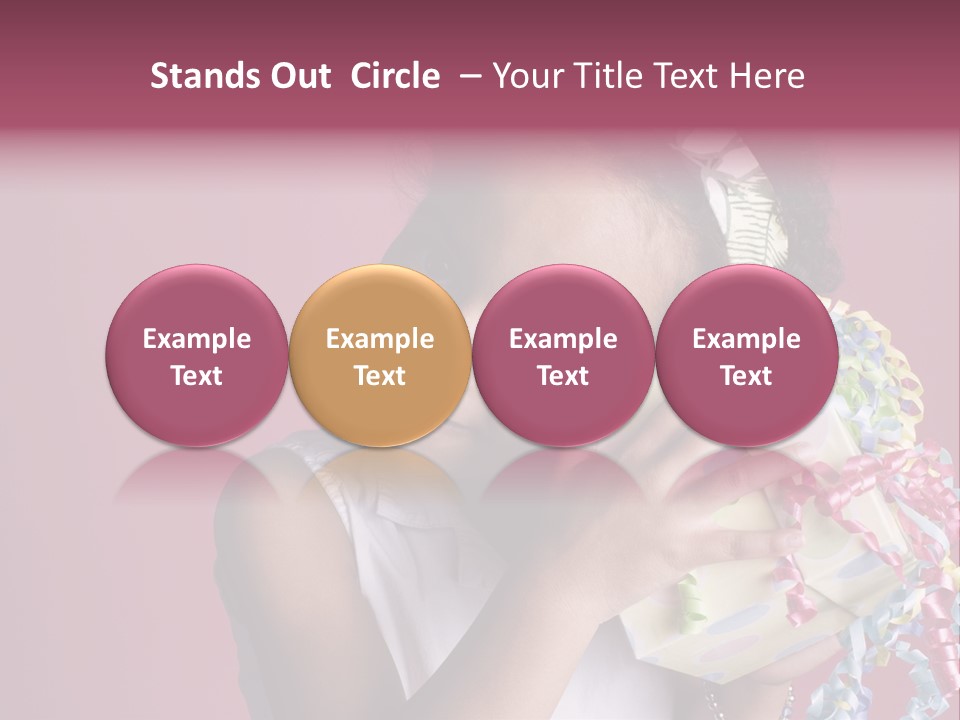 Portrait Of A Young Black Girl Sitting In A Chair Holding A Present PowerPoint Template