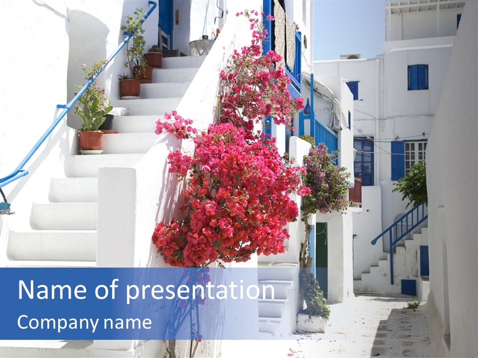 A White Building With A Blue Door And Stairs PowerPoint Template