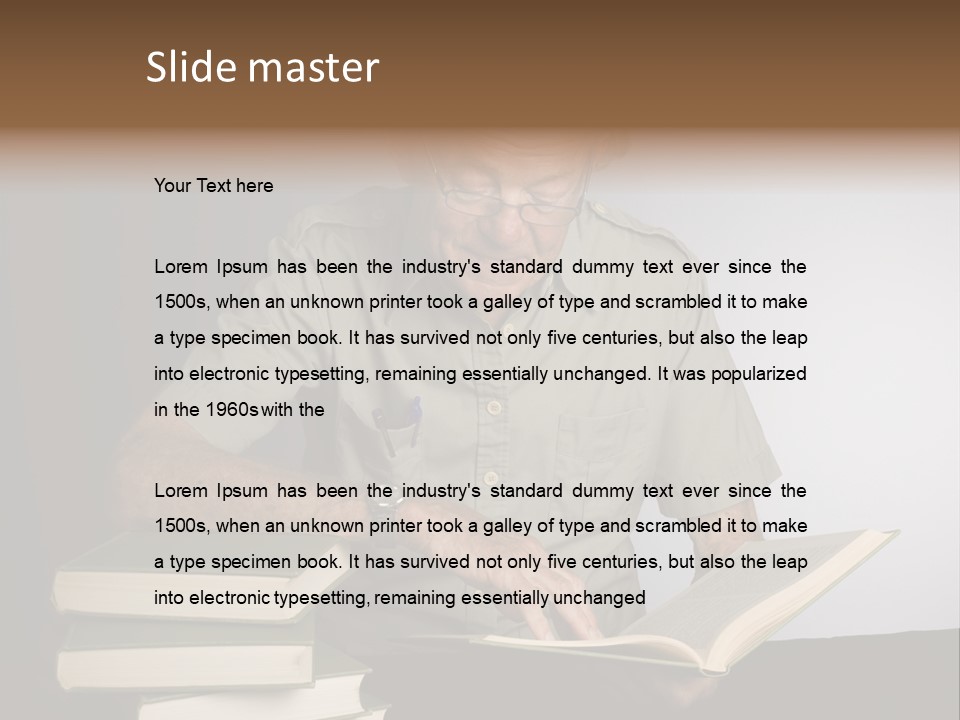 A Man Sitting At A Table With A Stack Of Books PowerPoint Template