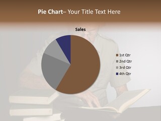 A Man Sitting At A Table With A Stack Of Books PowerPoint Template