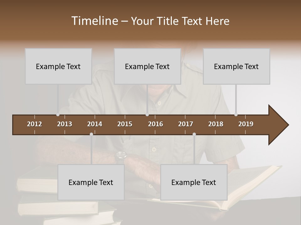 A Man Sitting At A Table With A Stack Of Books PowerPoint Template