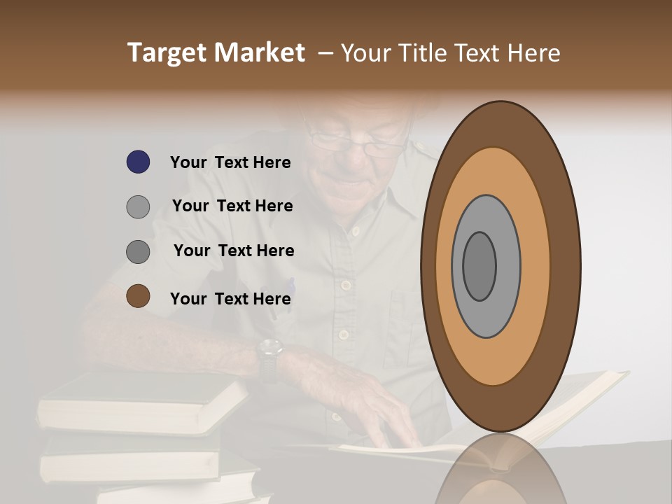 A Man Sitting At A Table With A Stack Of Books PowerPoint Template