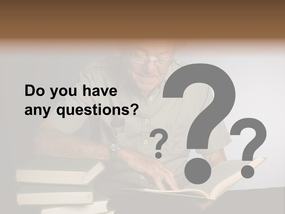 A Man Sitting At A Table With A Stack Of Books PowerPoint Template