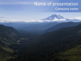 Mount Adams Surrounded By Clouds In Early Morning Light PowerPoint Template