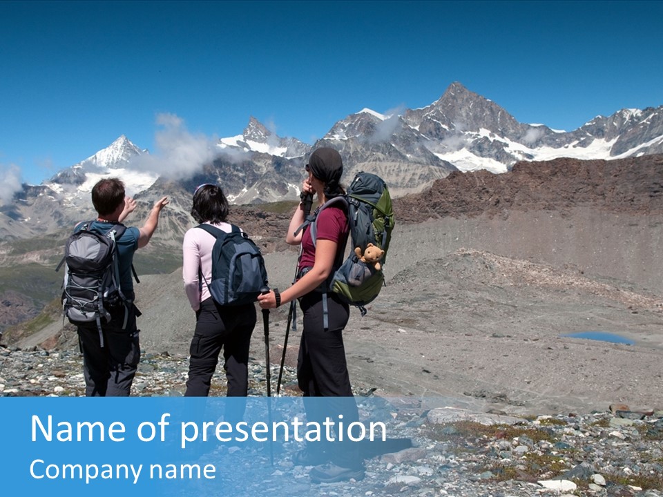Group Of Hikers Enjoying Beautiful Landscape Of Swiss Alps PowerPoint Template