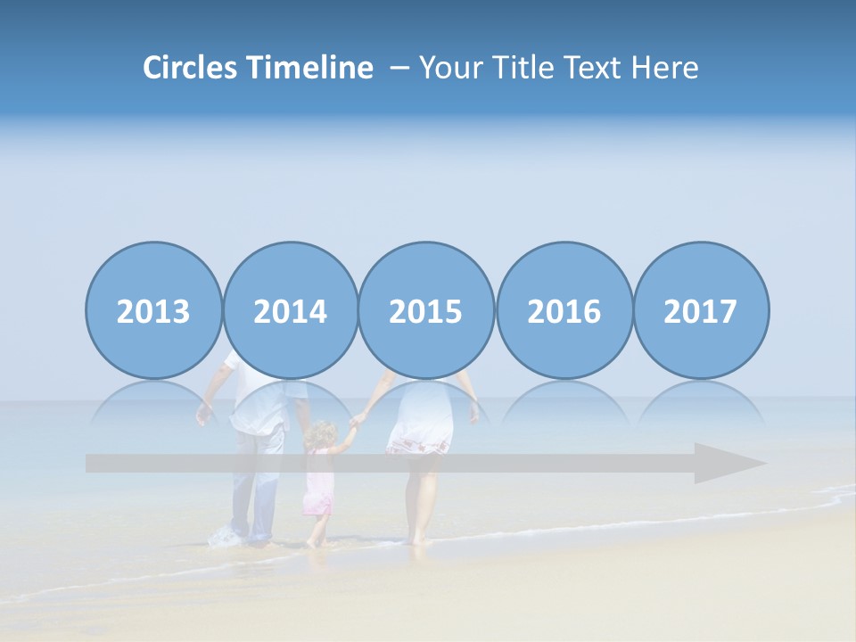 View Of Young Family Having Fun On The Beach PowerPoint Template