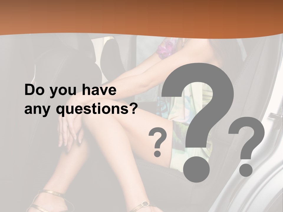 A Woman Sitting In The Back Seat Of A Car PowerPoint Template