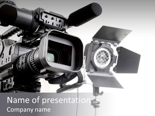 Isolated Digital Video Camera Recorder On Tripod And Spot Light With White Background PowerPoint Template