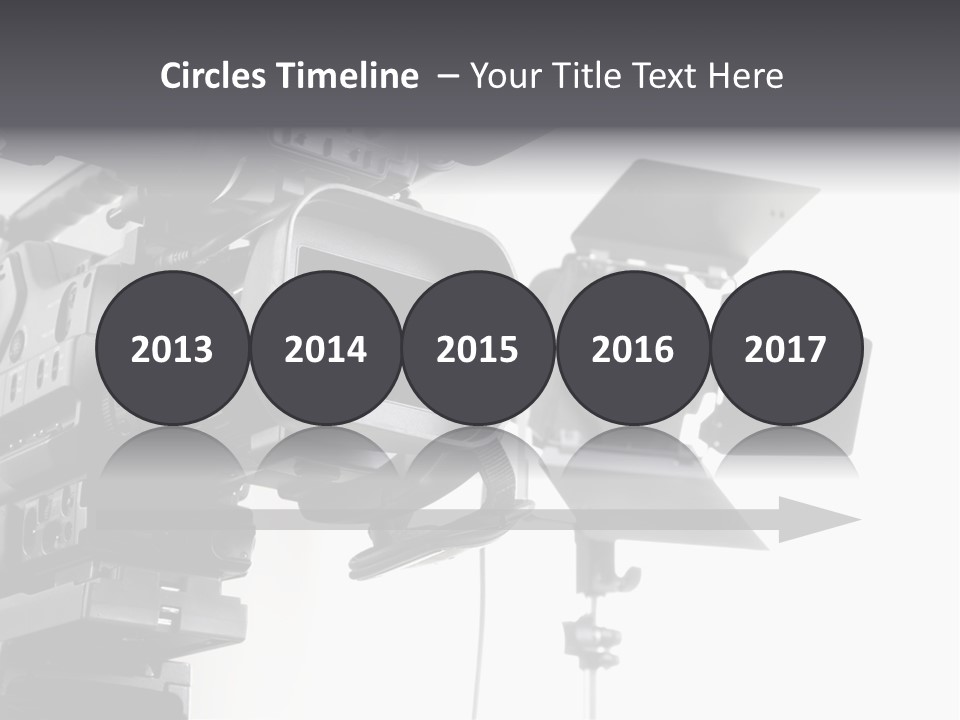 Isolated Digital Video Camera Recorder On Tripod And Spot Light With White Background PowerPoint Template