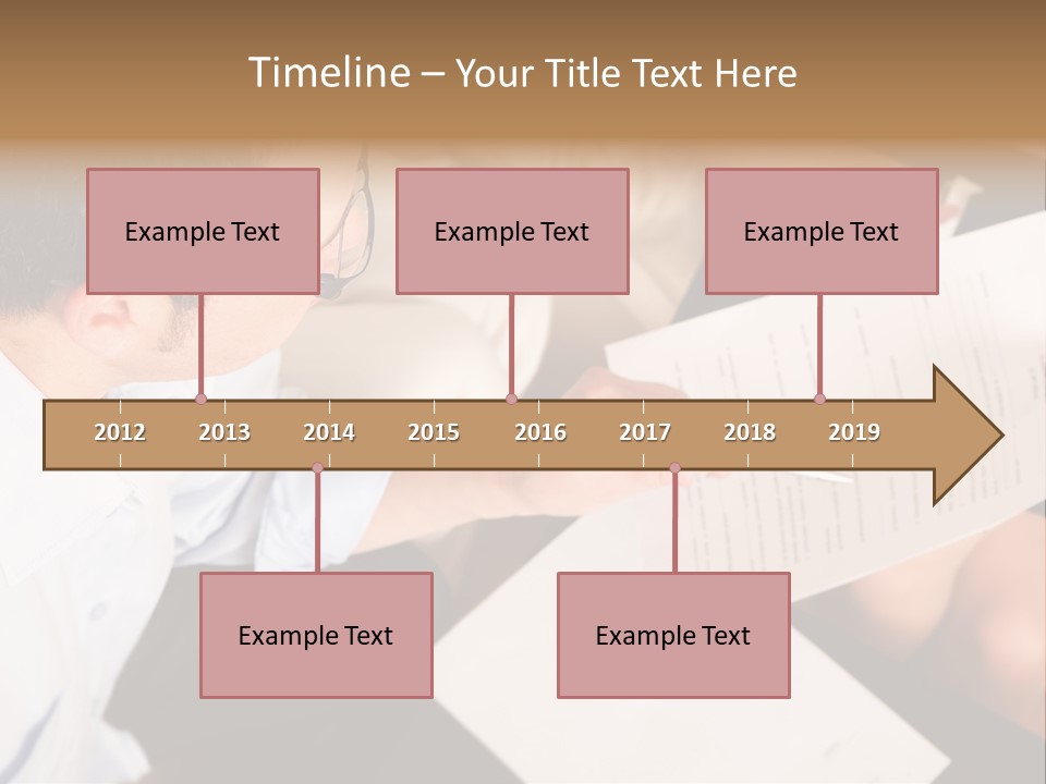 A Man Is Writing On A Piece Of Paper PowerPoint Template