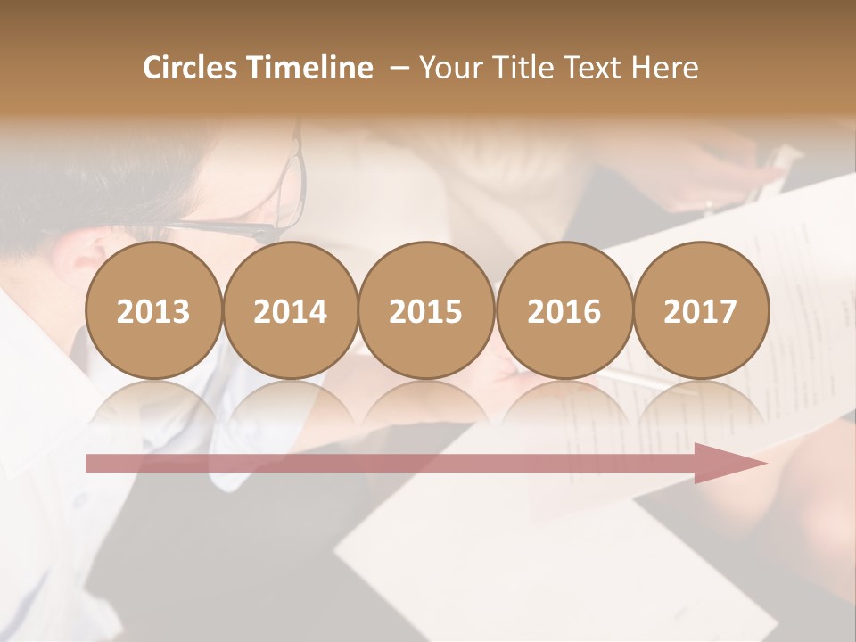 A Man Is Writing On A Piece Of Paper PowerPoint Template