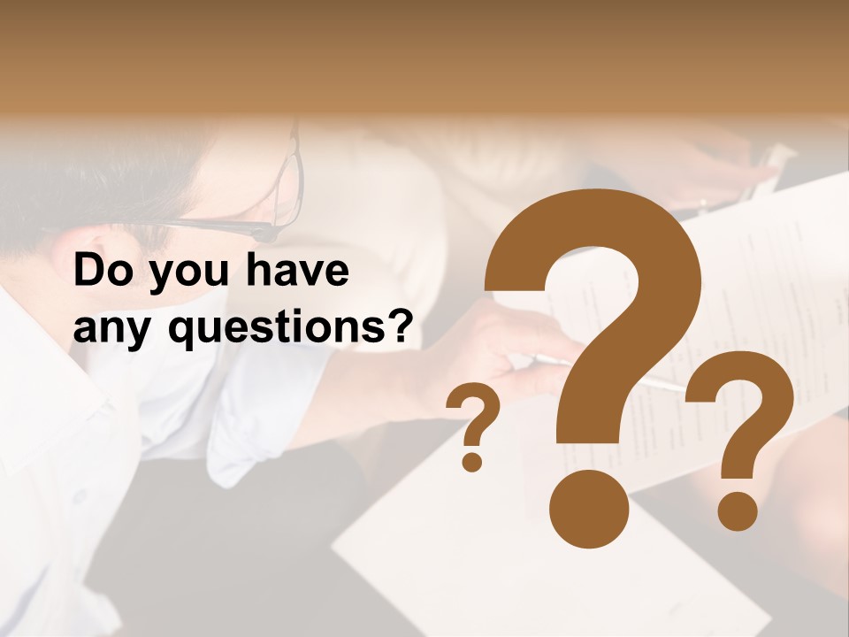 A Man Is Writing On A Piece Of Paper PowerPoint Template