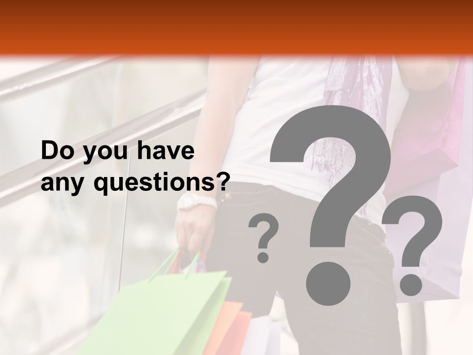 Woman On Scalators In A Shopping Mall Holding Some Bags PowerPoint Template