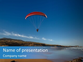 Paragliding In The Coastline Around Santander, Spain PowerPoint Template