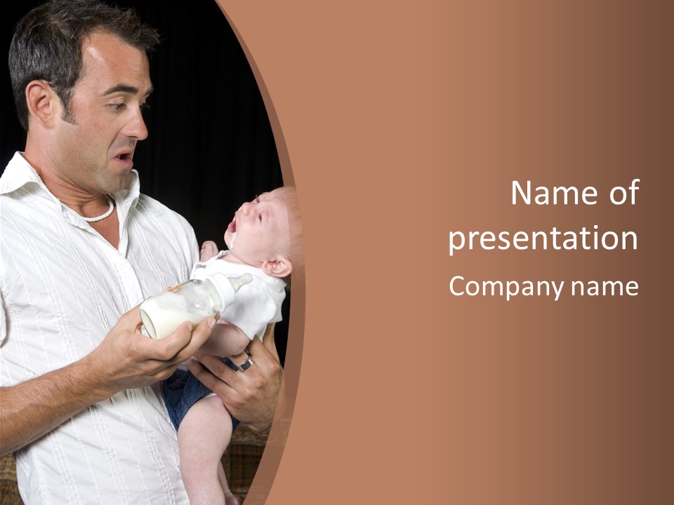 Young New Dad Learning To Take Care Of Cranky Newborn PowerPoint Template