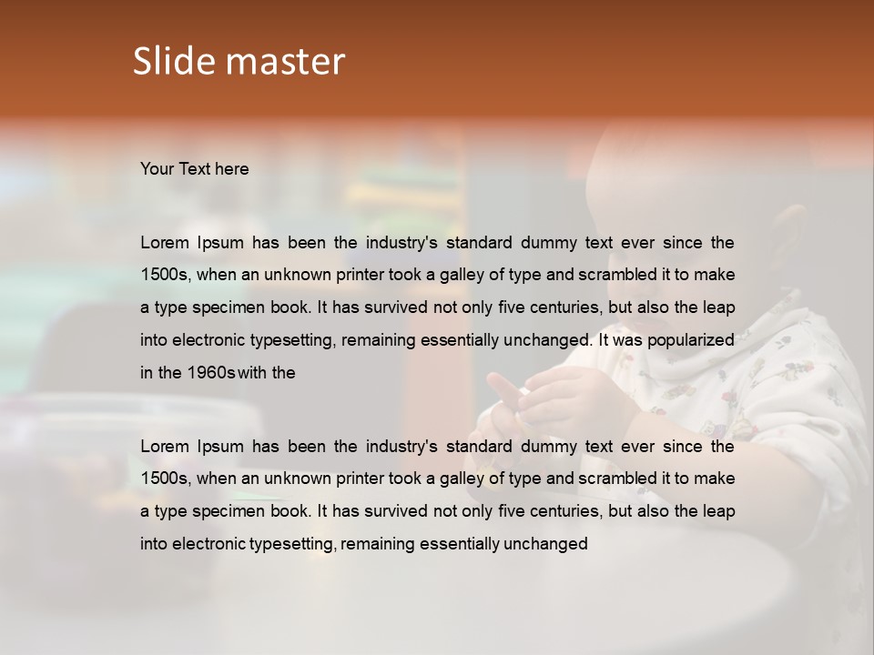 A Baby Sitting At A Table Playing With A Toy PowerPoint Template