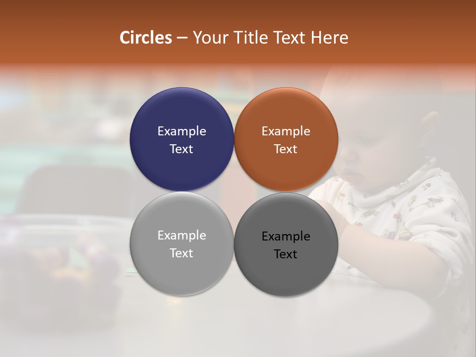 A Baby Sitting At A Table Playing With A Toy PowerPoint Template