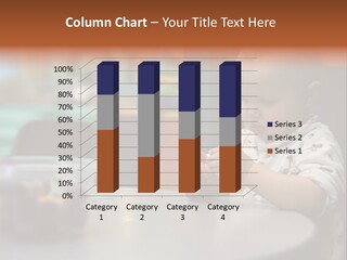 A Baby Sitting At A Table Playing With A Toy PowerPoint Template