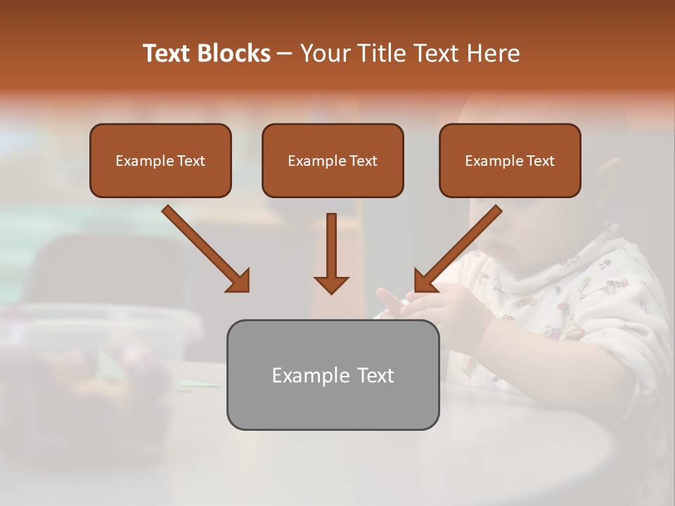A Baby Sitting At A Table Playing With A Toy PowerPoint Template