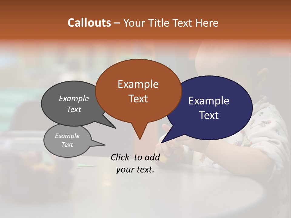 A Baby Sitting At A Table Playing With A Toy PowerPoint Template