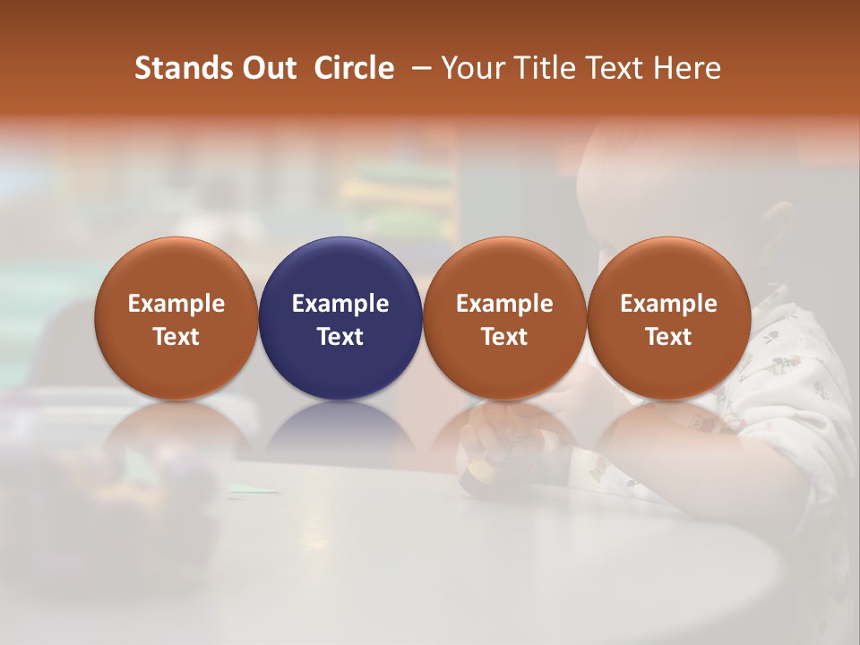 A Baby Sitting At A Table Playing With A Toy PowerPoint Template