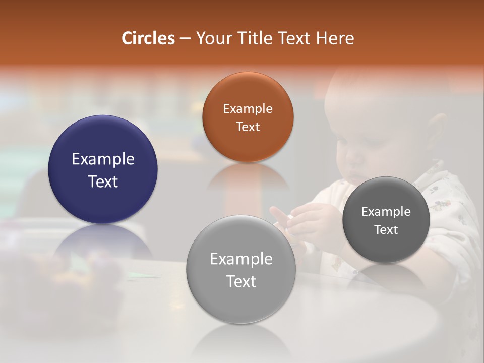 A Baby Sitting At A Table Playing With A Toy PowerPoint Template