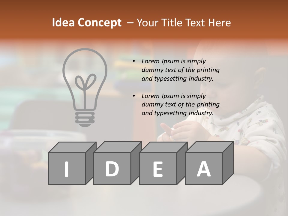 A Baby Sitting At A Table Playing With A Toy PowerPoint Template