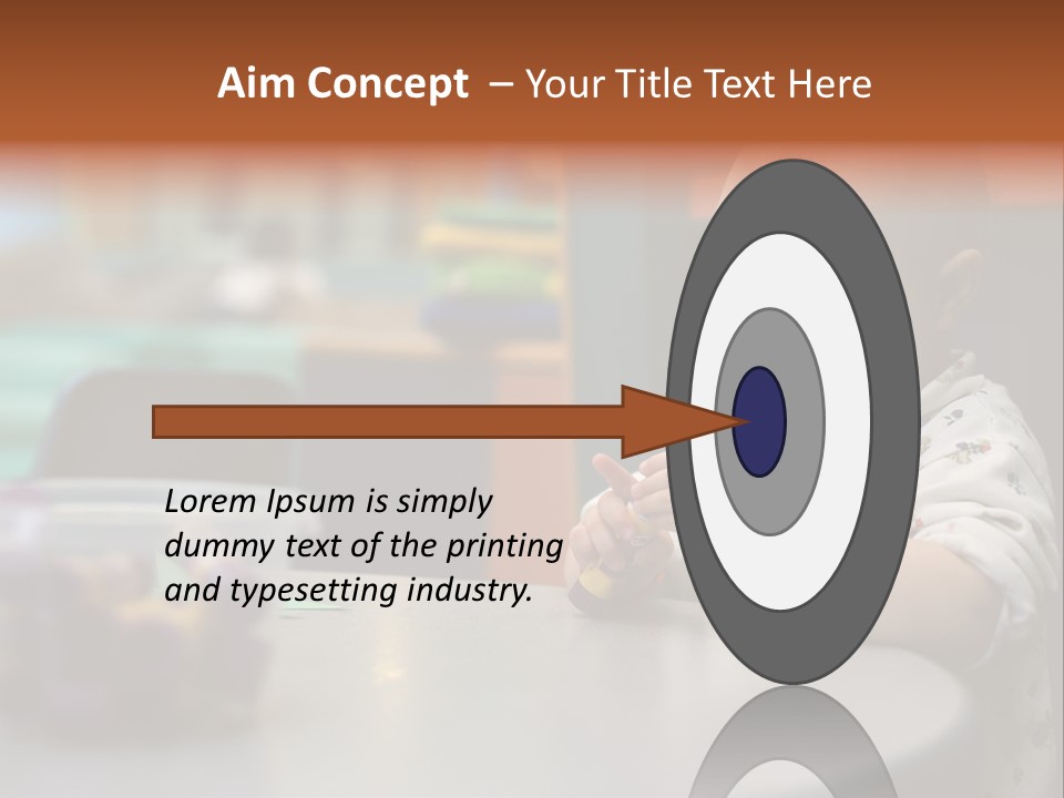 A Baby Sitting At A Table Playing With A Toy PowerPoint Template