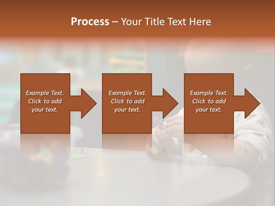 A Baby Sitting At A Table Playing With A Toy PowerPoint Template