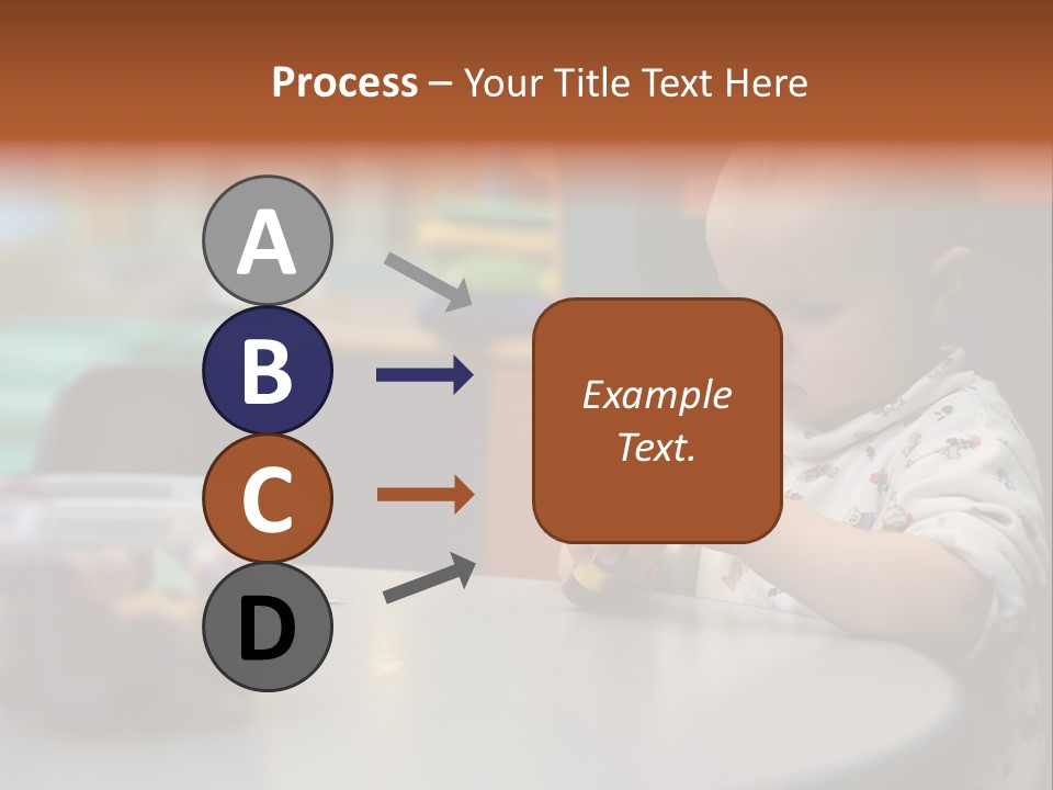 A Baby Sitting At A Table Playing With A Toy PowerPoint Template